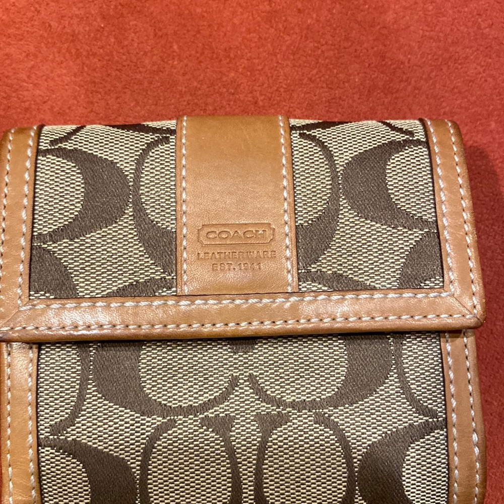 Coach signature vintage wallet, very handy, perfect size.